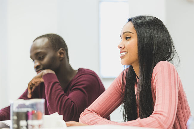Students sitting at a desk