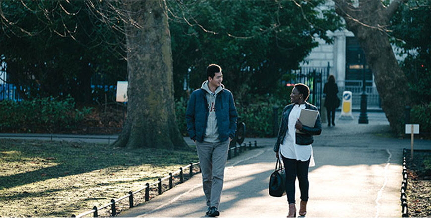 DIFC students walking through a park