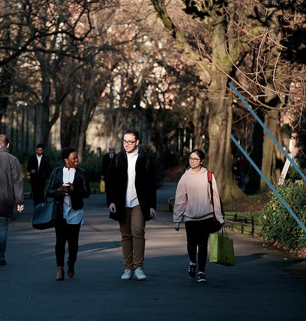 DIFC students walking through a park
